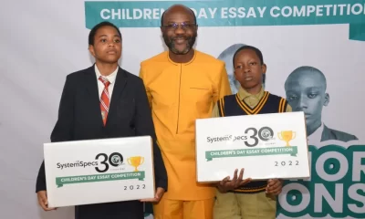 SystemSpecs Celebrates Essay Competition Champions SystemSpecs, Africa’s leading financial, human capital management, and e-commerce technology giant, the owner of Remita, HumanManager, and Paylink, has presented prizes to winners of the 30th anniversary edition of its annual Children’s Day Essay Competition at a hybrid ceremony which held recently. Top winners, all of whom were present or represented at the venue of the event in Lagos, were presented with gifts that included tens of high-capacity laptops, top-notch headphones, free 3-month uLesson coding courses, 480-gigabyte internet data for one year, branded travel suite cases, unique keepsake hoodies, thermal flasks, school bags, among many others. Some of the honourees are 11-year-old Oluwaseun Samuel Temitayo-Ojo of Igbobi College, Yaba, Lagos, and 15-year-old Ekemini Keziah Effiong-Robert of The African Church Model College, Agege, Lagos who emerged winners in the junior and senior categories respectively. Both emerged ahead of about 2,000 entrants from both private and public primary and secondary schools across the country. Also among the top 3 in each category are 10-year-old Somadina Edeh of Independence Layout Nursery and Primary School, Enugu State and Chetachi Best Mbalu from Lagooz School, Iyana-Ipaja, Lagos State, who emerged first runner-up in the junior and senior categories respectively; and 12-year-old Emmanuel Nkanu Nkanu of St Anne High School, Calabar, Cross River and 13-year-old David Nkereuwem of Holy Mary Comprehensive College, Benin City, Edo state emerged second runners-up in the junior and senior categories respectively. Others who made the top 15 Honour Roll in each category of the competition will also receive consolatory prizes to encourage them to remain innovative. The African Church Model College, Ifako Agege, Lagos and Igbobi College, Yaba, Lagos, that produced winning entries in the senior and junior categories, respectively, received 20 and 10 high-capacity laptops per school. “When they broke the news that I had won the competition to me, I could not contain my excitement. I am delighted that I won and believe it will birth even more significant achievements for me,” said Ekemini Keziah Effiong-Robert, the first-prize winner in the senior category. For Oluwaseun Samuel Temitayo-Ojo who was the champion in the junior category, it was a dream come true. “I am happy I won. I have always looked forward to such a glorious time as this. I want to thank my teachers and my parents for their support,” he said. Speaking on the feat of the champion from her school, Shade Oluyinka Erinle, principal of The African Church Model College, Ifako Agege, Lagos, expressed her excitement. “She has made us all proud,” she said, adding that the computers her school won would indeed add immense value to the school’s brand promise of delivering qualitative education. “On this special day, we crowned the champions of this year’s SystemSpecs Children’s Day Essay Competition and the schools that produced them in recognition of the need to emphatically celebrate young talents that emerge from Nigeria who have the potential to transform our world. “Not only have these young ones proffered solutions to some of Nigeria’s nagging challenges in the educational sector, but they also can champion the vision of a new and truly thriving country we all will be proud of,” said Oluwsegun Adesanya, Group Head, Corporate Services. “With the ambience of the occasion and the tangible excitement of the winning participants, other students, teachers, principals, parents and other well-wishers, we are once again reinvigorated to continue to impart the lives of Nigerians, young and old, irrespective of their location,” he added. The annual SystemSpecs Children’s Day Essay Competition is part of SystemSpecs’ Corporate Social Responsibility (CSR) commitment towards advancing capacity development in Nigeria, with a specific focus on creating opportunities for young people across Nigeria to share fresh, bright, and original ideas capable of transforming our country for good.
